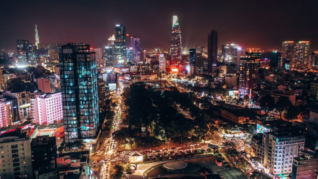 An aerial photograph of Ho Chi Minh City at night. The photo accompanies a blog post about a trip Hogan took to visit a distributor, Talent Assessments Vietnam. During the trip, Hogan discussed inclusive leadership in Vietnam.