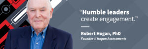 A headshot of Robert Hogan, PhD, founder and president of Hogan Assessments, appears to the left of a quote, spoken by him. The quote reads, "Humble leaders create engagement." The graphic accompanies a blog post about how humility builds trust and trust builds engagement.