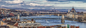 Dramatic cloudscape over Budapest cityscape with traditional typical buildings