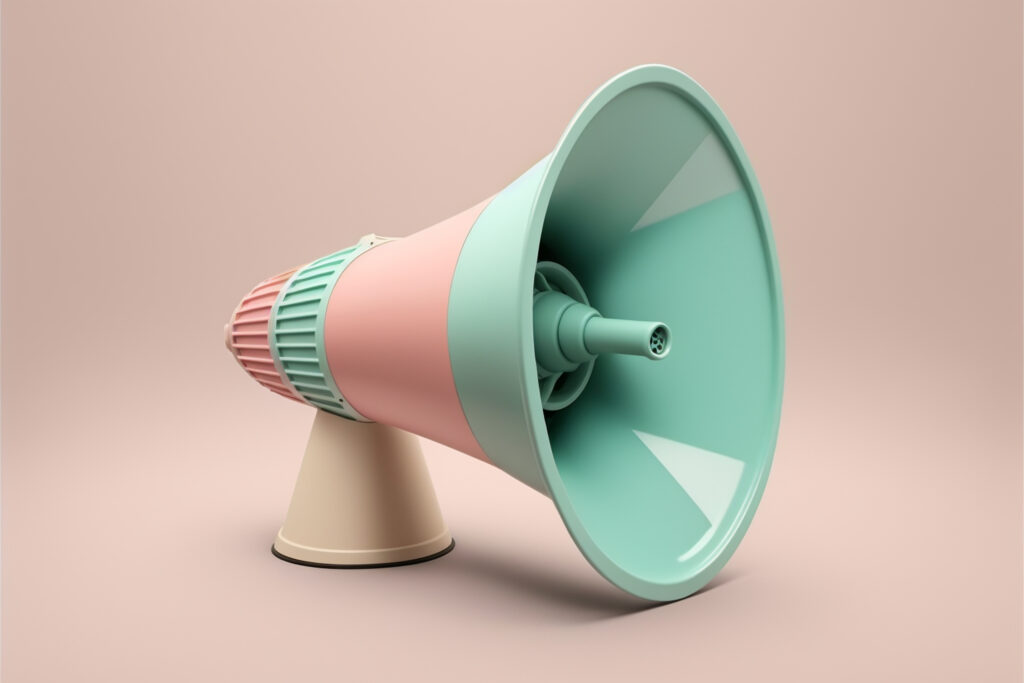 A retro pastel pink and mint green megaphone on a neutral background illustrates how workplace gossip amplifies informal information sharing.
