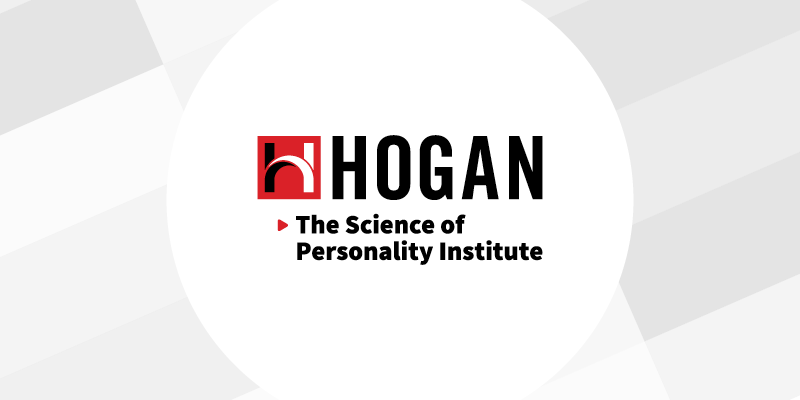 This image displays a Hogan logo above “The Science of Personality Institute” centered in a white circle on a light gray background.